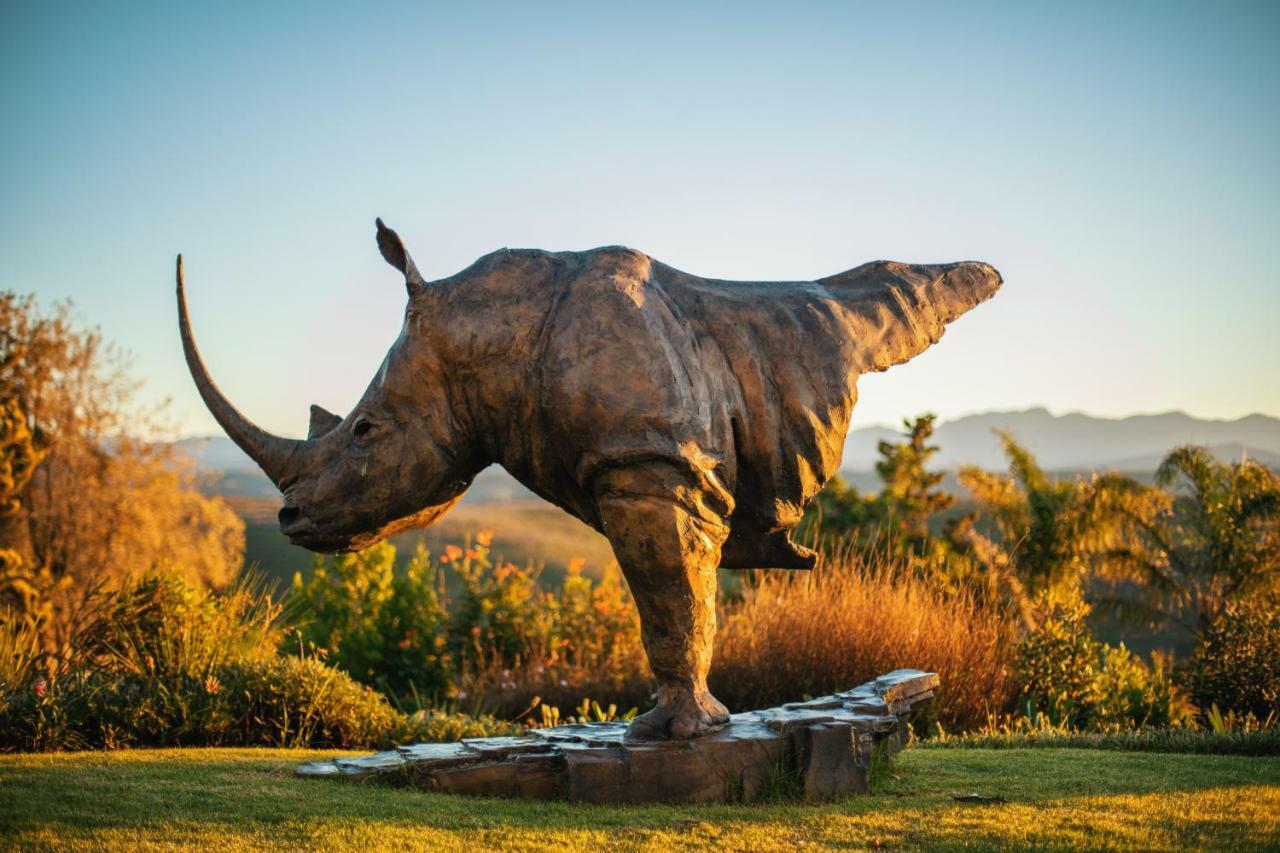 Sky Villa Boutique Hotel By Raw Africa Collection Plettenberg Bay Zewnętrze zdjęcie The sculpture of a white rhinoceros at the entrance of the park